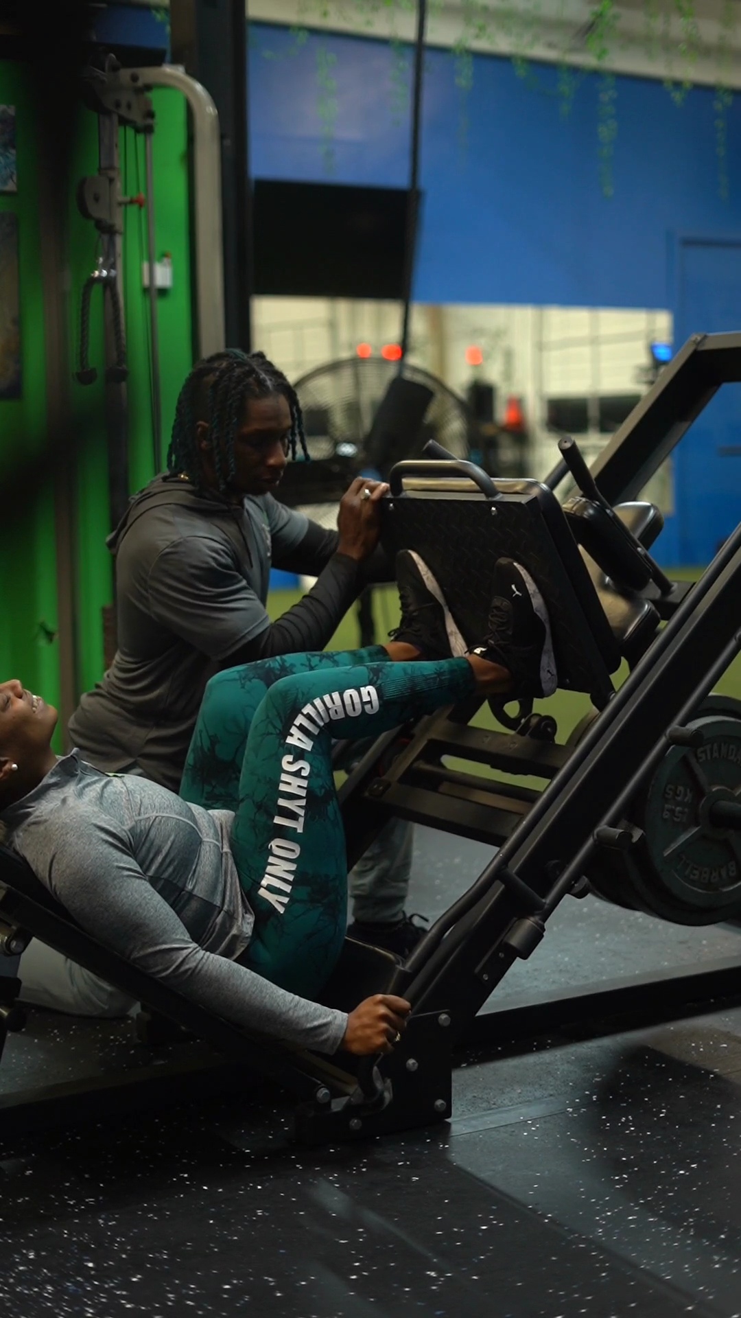 Trainer coaching a member during small group personal training